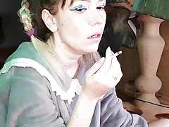 youthfull mummy smokes a ciggy