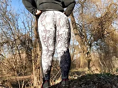 Phat ass white girl Cougar in taut stretch pants urinating outdoors rear end fashion
