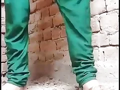 Desi damsel urinating in realm and wash slit after urinating