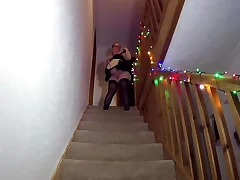 Maid cleaning the stairs in stocking